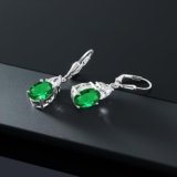 Illuminate Your Style with Gem Stone King 925 Sterling Silver Green Nano Emerald and White Zirconia Dangle Earrings